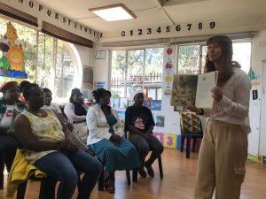 Literacy workshop, teaching parents how to read to their kids